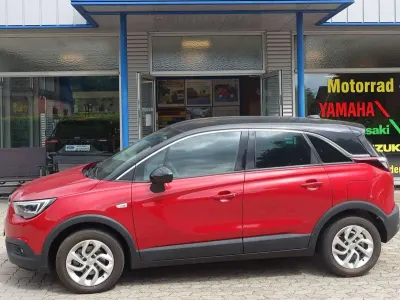 Gebraucht Opel Crossland X 110 PS (80 kW) 2020 Peperoncino red / dach schwarz SUV
