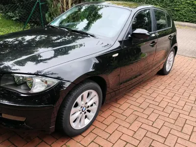 Gebraucht BMW 116 122 PS (89 kW) 2008 Schwarz Kleinwagen