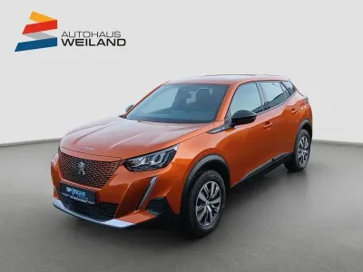 Gebraucht Peugeot e-2008 Active 100 kW (136 PS) 2023 Orange SUV