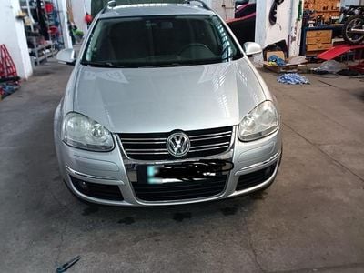 Second-hand VW Golf V 104 CP (76 kW) 2009 Argintiu Break