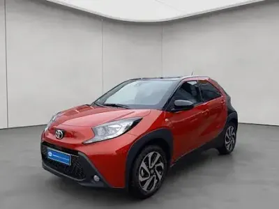 Gebraucht Toyota Aygo X Team 72 PS (52 kW) 2024 Chili red / night sky black SUV