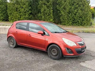 Gebraucht Opel Corsa 87 PS (63 kW) 2012 Orange Kleinwagen