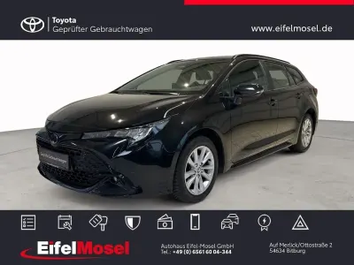 Gebraucht Toyota Corolla Business Edition 196 PS (144 kW) 2023 Black mica / ink (metallic) Kombi