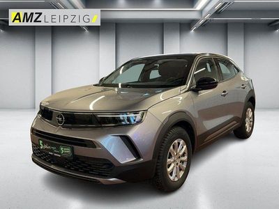 Gebraucht Opel Mokka Edition 131 PS (96 kW) 2022 Kontrast grau/quarz silber (metallic) SUV