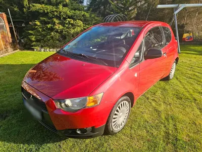 Gebraucht Mitsubishi Colt 75 PS (55 kW) 2009 Rot Kleinwagen