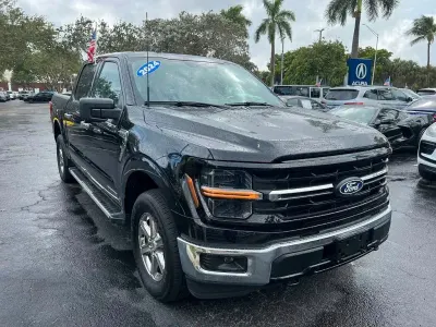 Gebraucht Ford F-150 XLT 436 PS (320 kW) 2024 Agate black metallic Pickup