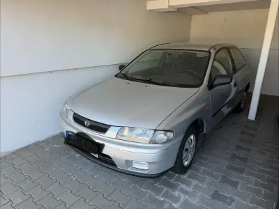 Brugt Mazda 323 73 HK (53 kW) 1998 Sølv Sedan