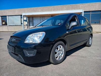 Second-hand Kia Carens Basis 144 CP (105 kW) 2009 Negru Monovolum