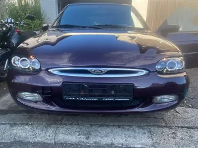 Gebraucht Ford Escort Cabriolet 90 PS (66 kW) 1997 Violet Cabrio