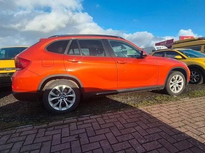 Second-hand BMW X1 Performance 218 CP (160 kW) 2015 Portocaliu SUV