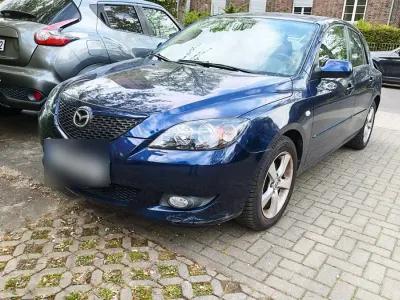 Używany Mazda 3 Comfort 105 KM (77 kW) 2005 Niebieski Sedan/Limuzyna