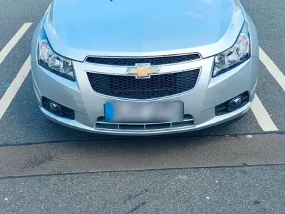 Używany Chevrolet Cruze 104 KM (76 kW) 2013 Srebrny Sedan/Limuzyna
