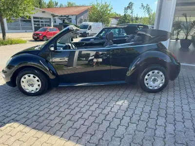 Gebraucht VW New Beetle 75 PS (55 kW) 2004 Schwarz Kleinwagen