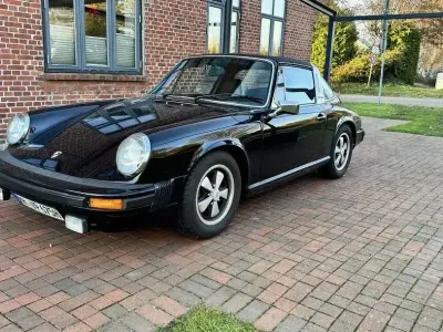 Second-hand Porsche 911 175 CP (128 kW) 1975 Negru Coupe