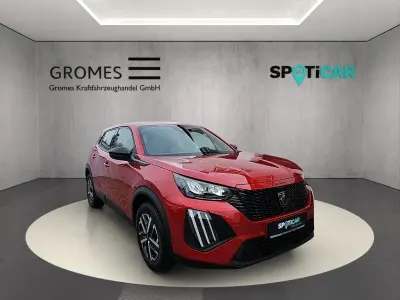 Gebraucht Peugeot 2008 Active 101 PS (74 kW) 2023 Elixierrot (metallic) SUV