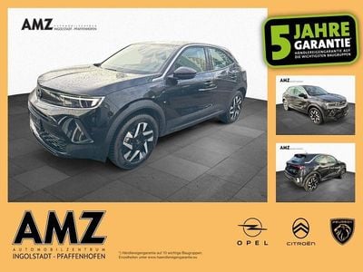 Gebraucht Opel Mokka-e Elegance 100 kW (136 PS) 2023 Lackierung schwarz perla nera/ SUV