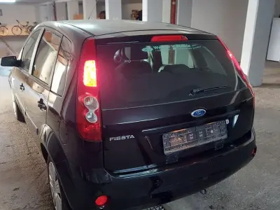 Używany Ford Fiesta Trend 69 KM (50 kW) 2006 Czarny Hatchback
