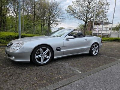 Second-hand Mercedes SL500 306 CP (225 kW) 2004 Argintiu Cabrio