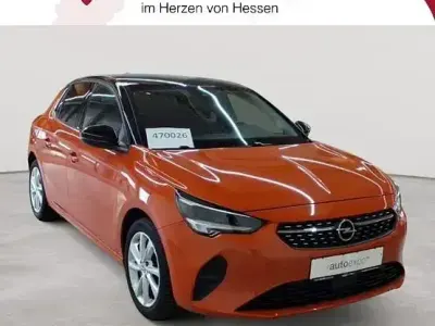 Gebraucht Opel Corsa Elegance 75 PS (55 kW) 2023 Dynamik orange metallic/dach karbon schwarz metallic Kleinwagen