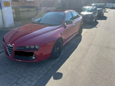 Second-hand Alfa Romeo 159 Turismo 260 CP (191 kW) 2012 Roșu Berlinǎ