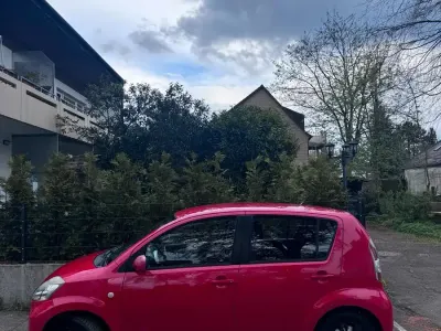 Gebraucht Daihatsu Sirion 75 PS (55 kW) 2005 Rot Kleinwagen
