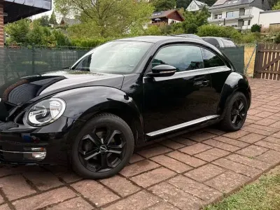 Gebraucht VW Beetle Exclusive 105 PS (77 kW) 2014 Schwarz Kleinwagen