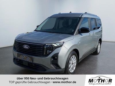 Gebraucht Ford Tourneo Courier Titanium 125 PS (91 kW) 2024 Solarsilber Van / Kleinbus