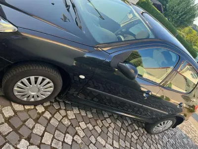Gebraucht Peugeot 206 60 PS (44 kW) 2004 Schwarz Limousine