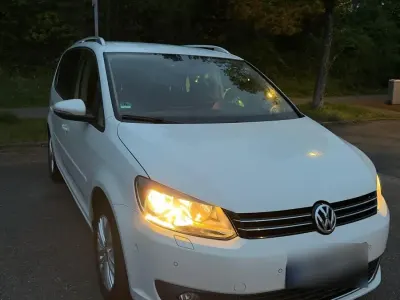 Second-hand VW Touran 105 CP (77 kW) 2014 Alb Monovolum