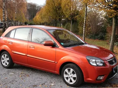 Gebraucht Kia Rio Vision 97 PS (71 kW) 2010 Orange Limousine