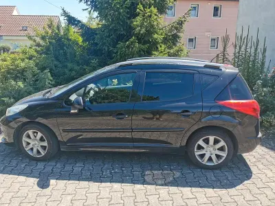 Gebraucht Peugeot 207 109 PS (80 kW) 2009 Schwarz Kombi