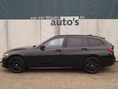 Second-hand BMW 320e 163 CP (119 kW) 2022 Negru Break