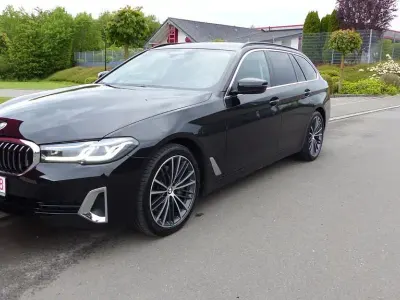 Gebraucht BMW 540 Luxury Line 340 PS (250 kW) 2023 Schwarz ii/bonnet fluid black Kombi