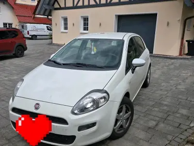 Gebraucht Fiat Punto Evo 77 PS (56 kW) 2013 Weiß Kleinwagen
