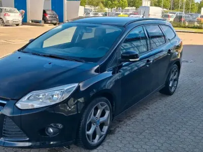 Gebraucht Ford Focus 115 PS (84 kW) 2012 Schwarz Kombi