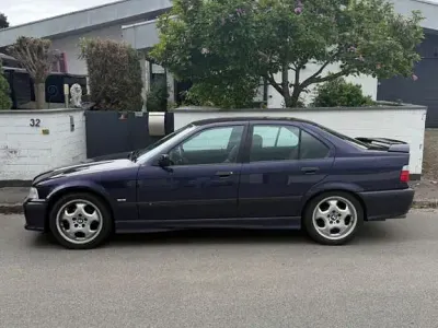 Gebraucht BMW 318 M Sport 116 PS (85 kW) 1996 Violet Limousine