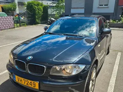 Gebraucht BMW 116 116 PS (85 kW) 2010 Schwarz Kleinwagen