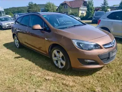 Używany Opel Astra 140 KM (102 kW) 2015 Brązowy Kombi