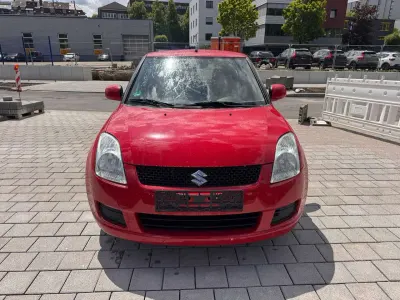Gebraucht Suzuki Swift Snow 92 PS (67 kW) 2010 Rot Kleinwagen