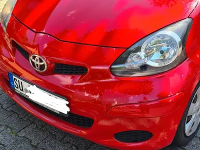 Gebraucht Toyota Aygo 60 PS (44 kW) 2011 Rot Kleinwagen