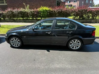 Gebraucht BMW 316 105 PS (77 kW) 1999 Schwarz Limousine