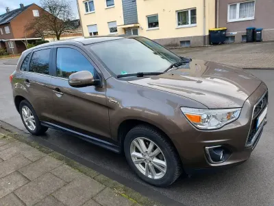 Używany Mitsubishi ASX Comfort Edition 150 KM (110 kW) 2014 Brązowy SUV