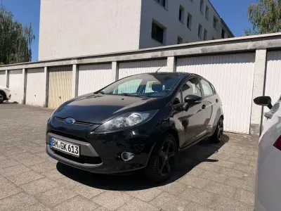 Gebraucht Ford Fiesta Trend 82 PS (60 kW) 2012 Schwarz Limousine