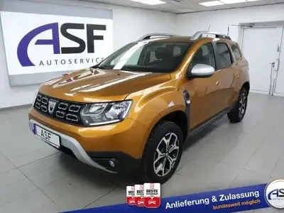 Używany Dacia Duster Prestige 101 KM (74 kW) 2020 Pomarańczowy SUV