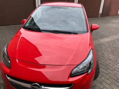 Usado Opel Corsa Edition 69 HP (50 kW) 2016 Vermelho Citadino