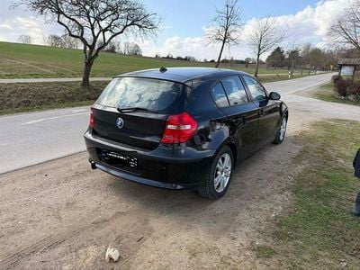 Gebraucht BMW 116 122 PS (89 kW) 2009 Schwarz Kleinwagen