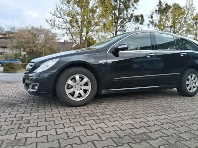 Käytetty Mercedes R320 224 HP (164 kW) 2006 Musta Tila-auto