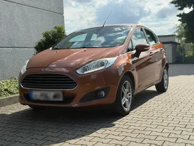 Gebraucht Ford Fiesta 95 PS (69 kW) 2014 Orange Kleinwagen