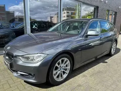 Second-hand BMW 330 Sport Line 258 CP (189 kW) 2013 Gri Break