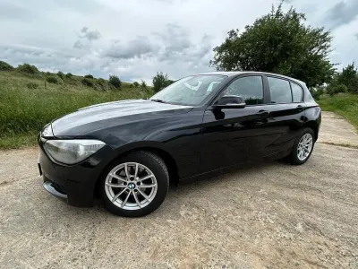 Gebraucht BMW 116 Sport Line 136 PS (100 kW) 2012 Schwarz Kleinwagen